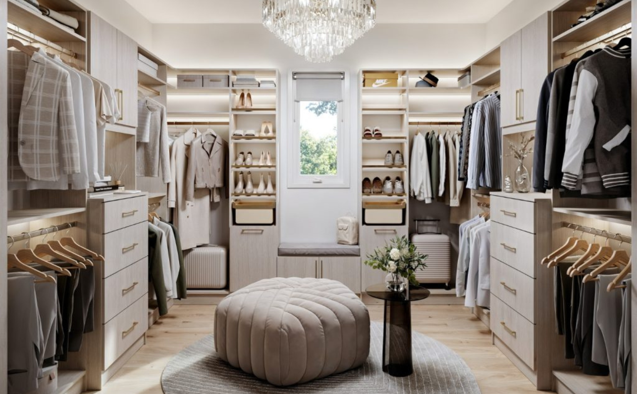 Luxurious primary closet installation with chandelier